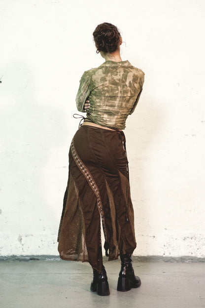 model wearing from back Double Collar Voile Shirt Hand Dyed Silk Cotton with Long Sleeves & Shirred Waist & hook and eye