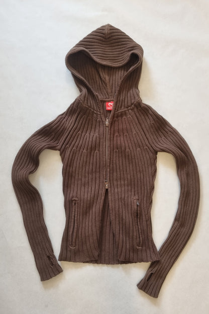 Brown ribbed hoodie with double zipper with a red tag on a light gray background